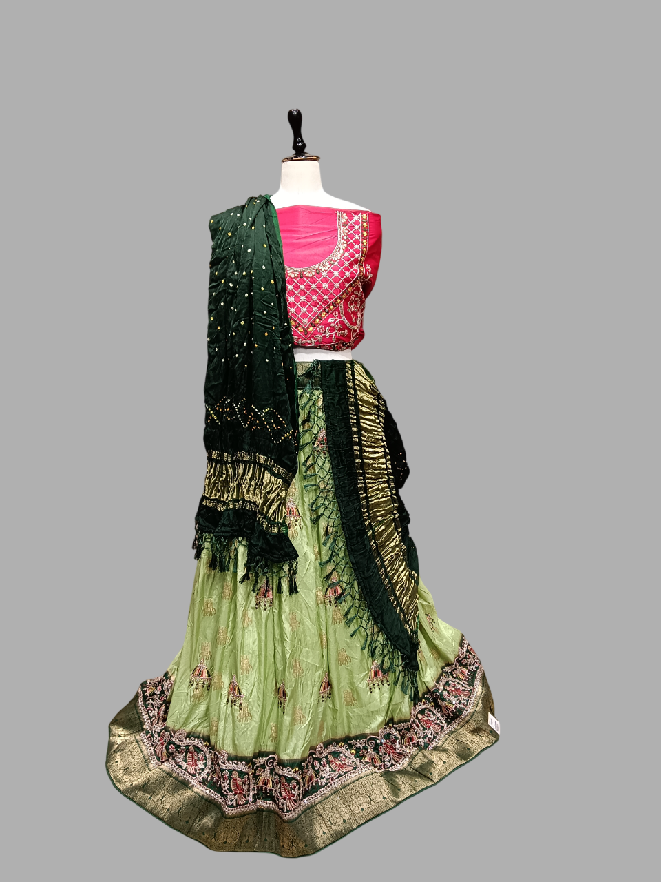 Designer Green Lehenga with Rani Pink Embroidered Blouse and Dark Green Bandhej Dupatta D510 Designer Green Lehenga with Rani Pink Embroidered Blouse and Dark Green Bandhej Dupatta D510